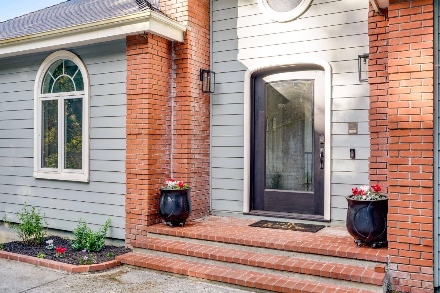 18565 Overlook Road Monte Sereno, CA 95030 - Photo 4 of 72 a view of a door of the house with a potted plant