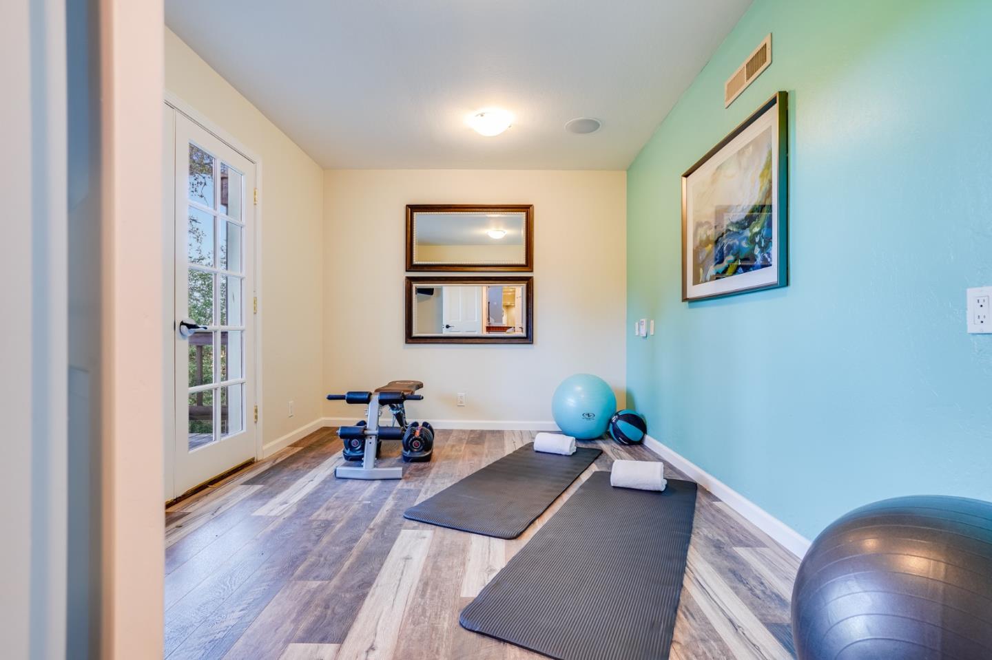 18565 Overlook Road Monte Sereno, CA 95030 - Photo 33 of 72 a living room with furniture and a wooden floor