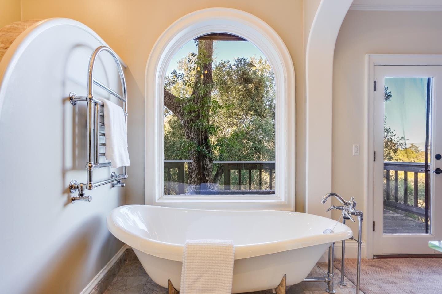 18565 Overlook Road Monte Sereno, CA 95030 - Photo 37 of 72 a bath tub sitting in a bathroom next to a window