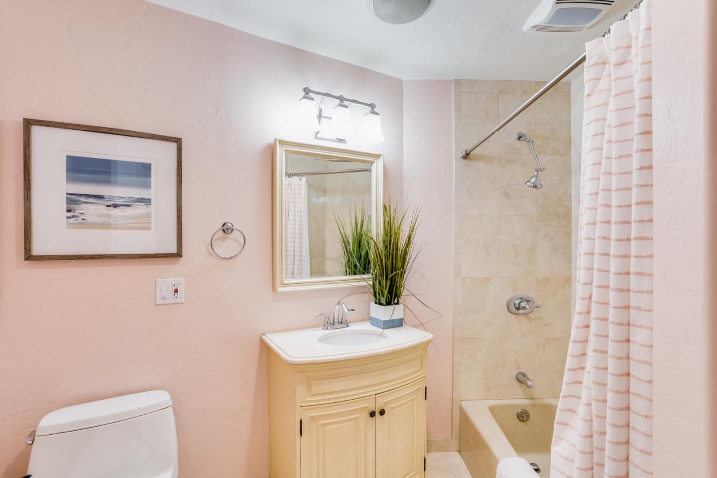 18565 Overlook Road Monte Sereno, CA 95030 - Photo 48 of 72 a bathroom with a granite countertop sink a toilet and shower