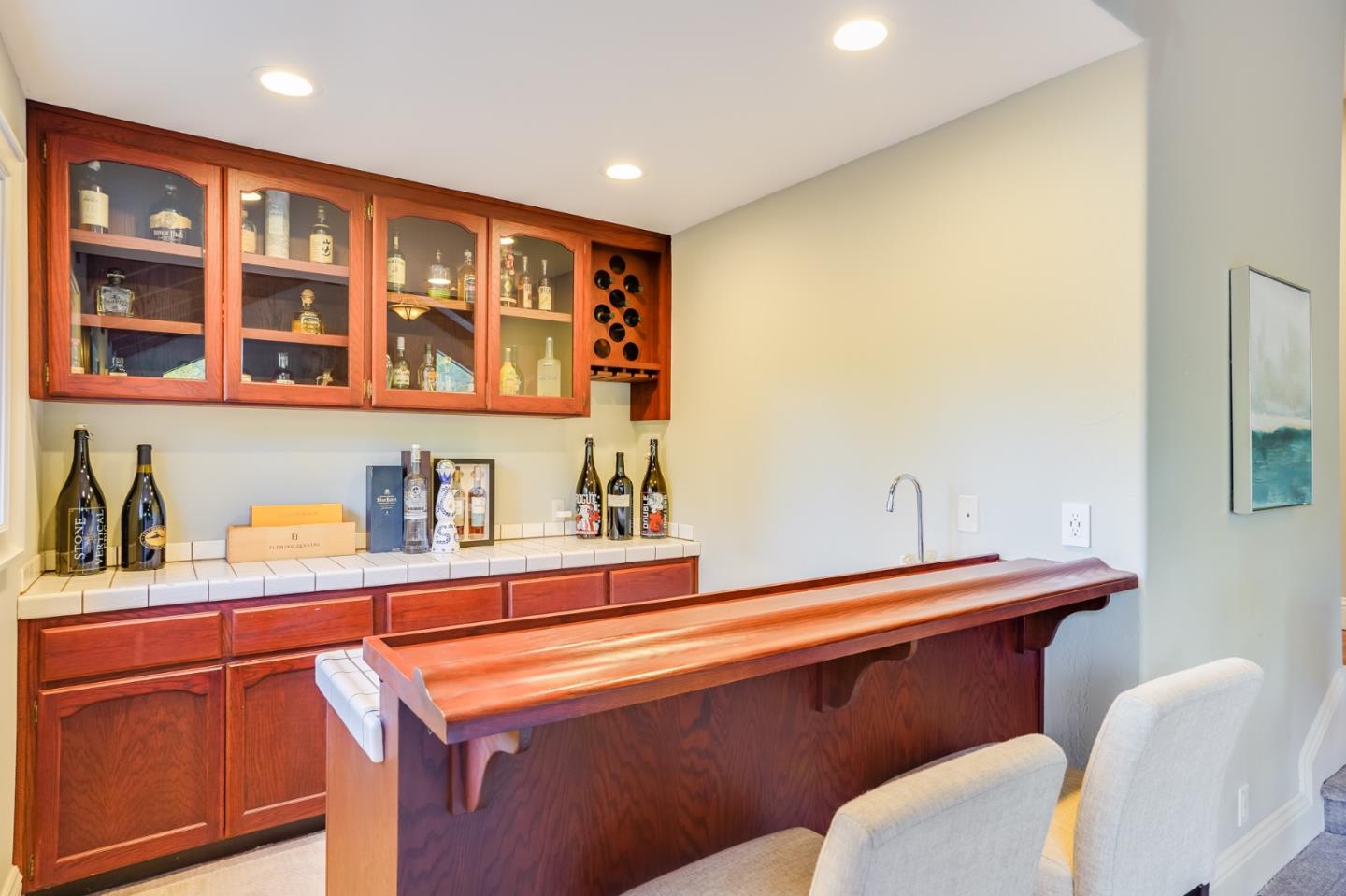 18565 Overlook Road Monte Sereno, CA 95030 - Photo 8 of 72 a room with stainless steel appliances kitchen island granite countertop a sink and cabinets