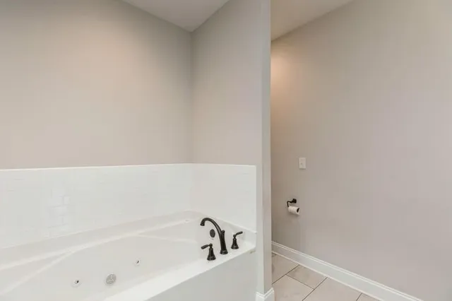 a bathroom with a bathtub