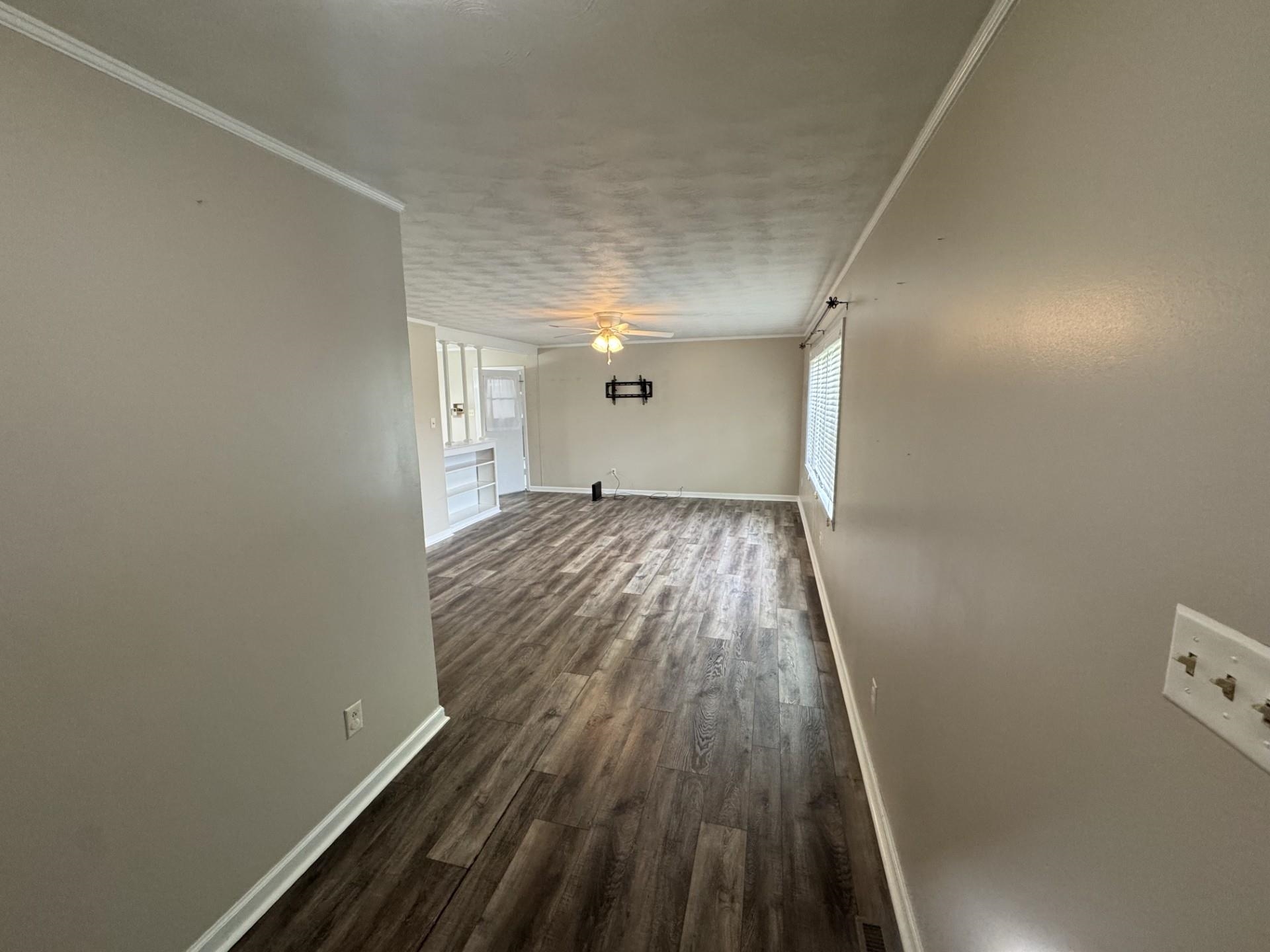 2631 Highway 51 Ripley, TN 38063 - Photo 4 of 17 a view of a hallway with wooden floor