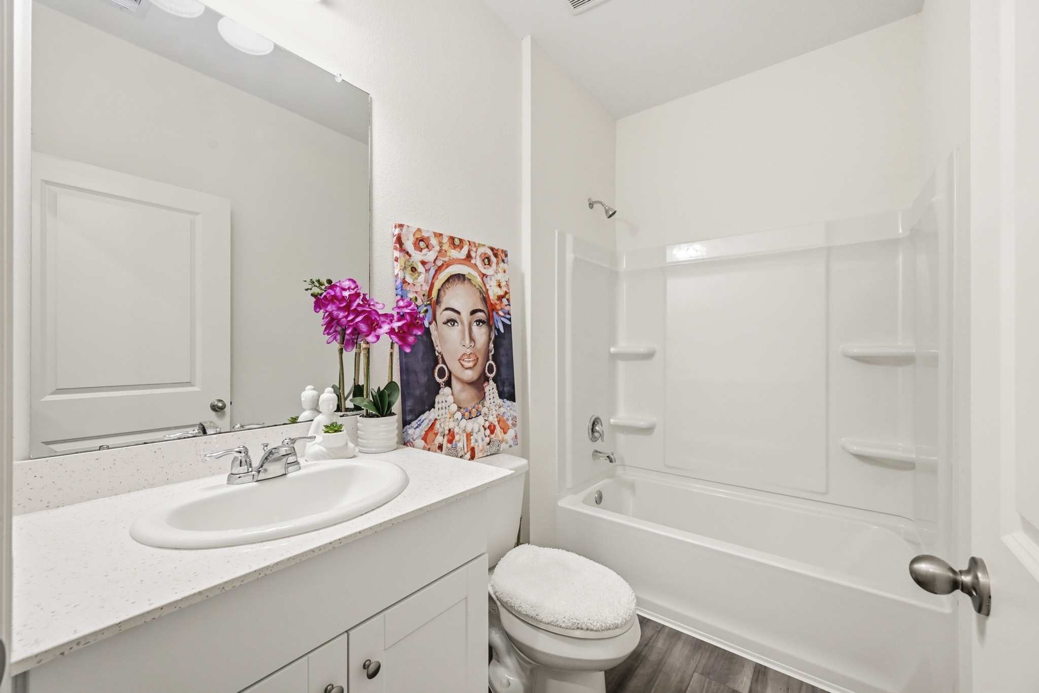 7207 Evitale Way Houston, TX 77049 - Photo 36 of 43 a bathroom with a sink a toilet and shower