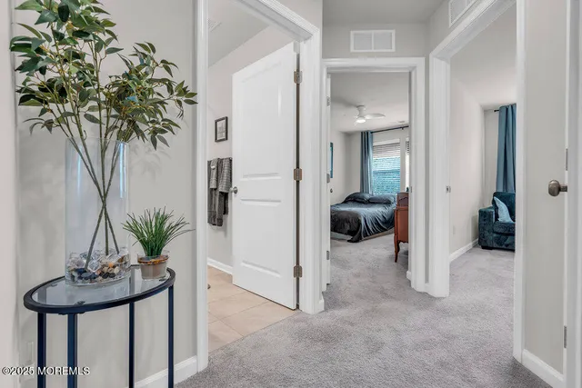 a view of entryway and livingroom with furniture
