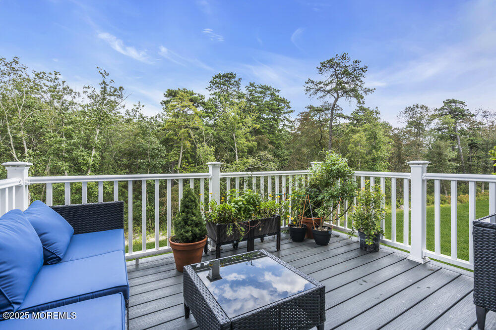 8 Avalon Lane Jackson, NJ 08527 - Photo 21 of 30 a view of a deck with a chair