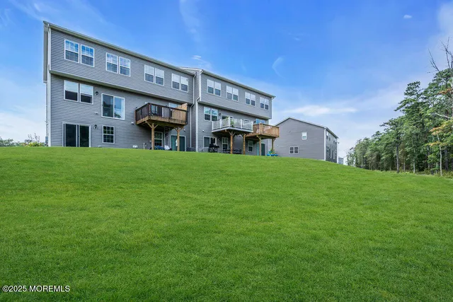 a view of a building with a yard