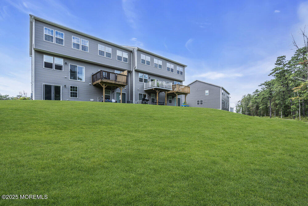 8 Avalon Lane Jackson, NJ 08527 - Photo 23 of 30 a view of a building with a yard