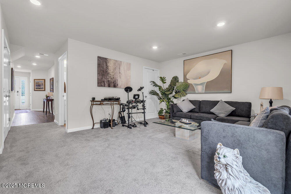 8 Avalon Lane Jackson, NJ 08527 - Photo 6 of 30 a living room with furniture and a large window