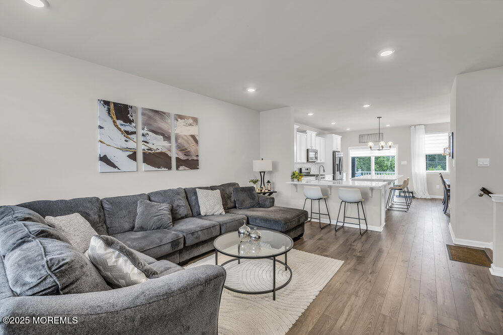 8 Avalon Lane Jackson, NJ 08527 - Photo 8 of 30 a living room with furniture and wooden floor