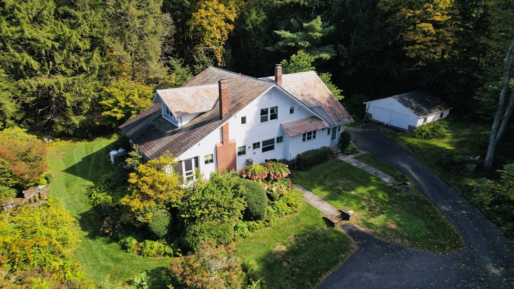 83 Mountain Road Wilbraham, MA 01095 - Photo 1 of 42 an aerial view of a house with a yard