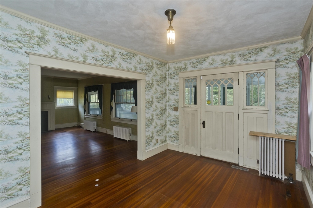 83 Mountain Road Wilbraham, MA 01095 - Photo 14 of 42 wooden floor in an empty room with a window