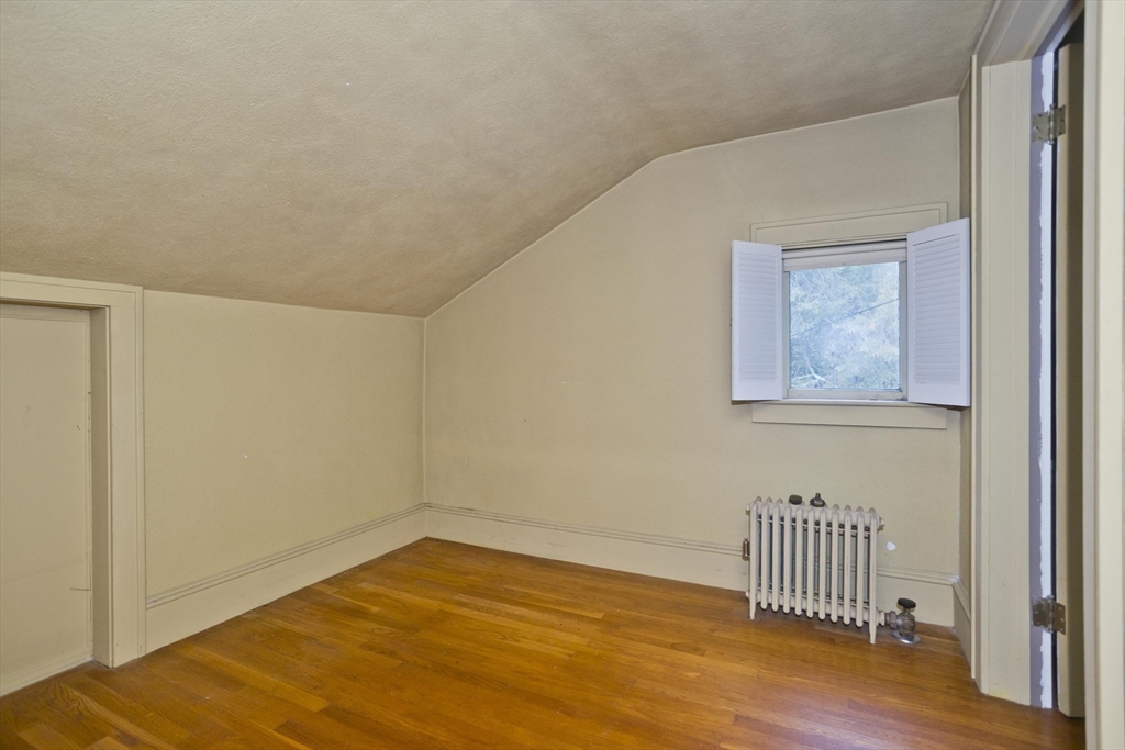 83 Mountain Road Wilbraham, MA 01095 - Photo 19 of 42 a view of an empty room with wooden floor
