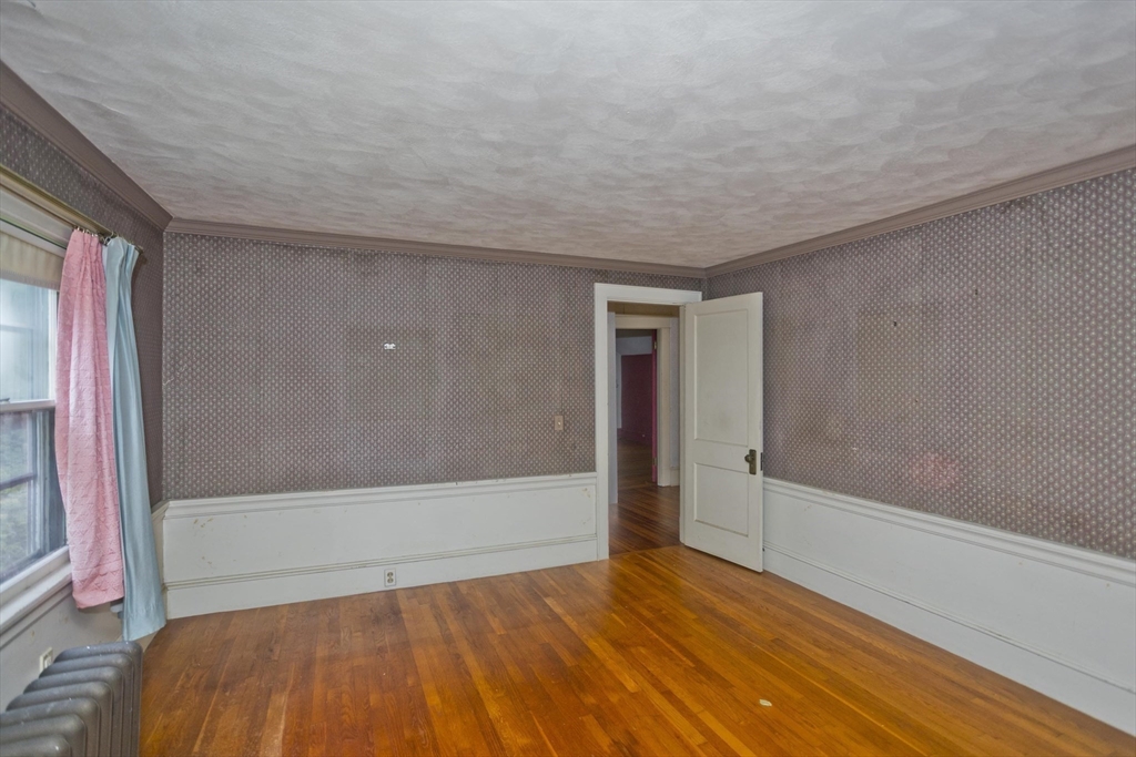 83 Mountain Road Wilbraham, MA 01095 - Photo 20 of 42 a view of room with window and wooden floor