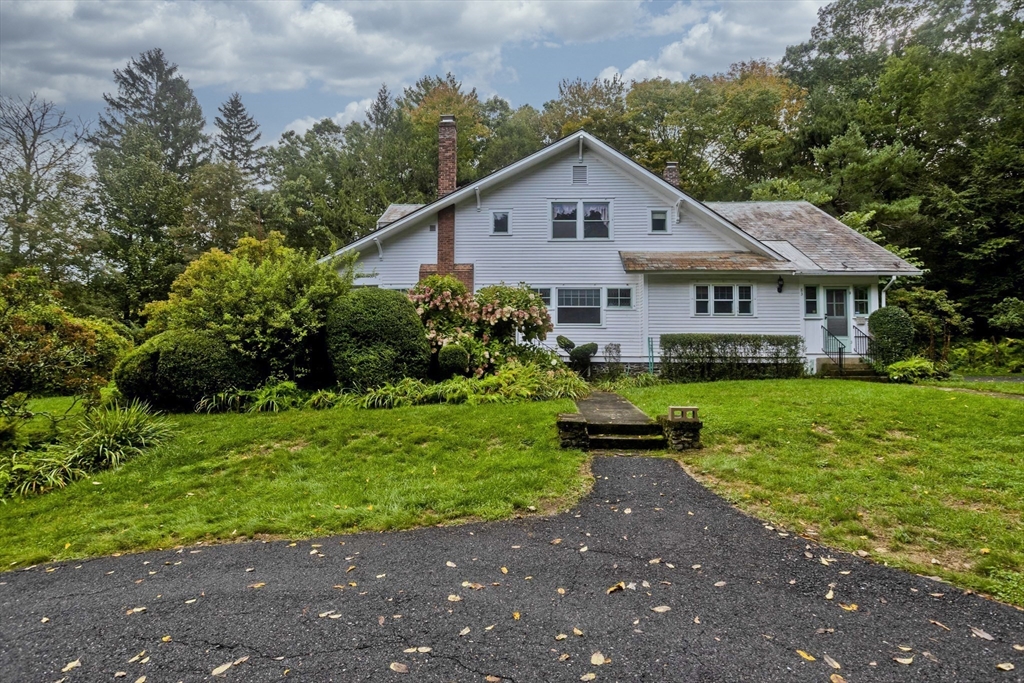 83 Mountain Road Wilbraham, MA 01095 - Photo 2 of 42 a front view of a house with garden