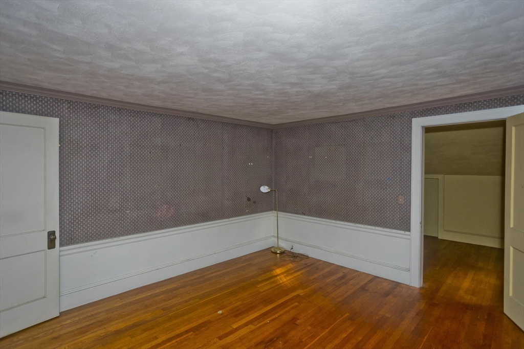 83 Mountain Road Wilbraham, MA 01095 - Photo 21 of 42 a view of empty room with wooden floor
