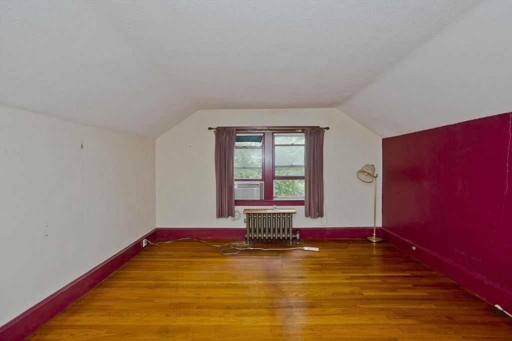 83 Mountain Road Wilbraham, MA 01095 - Photo 24 of 42 a view of empty room with wooden floor and fan