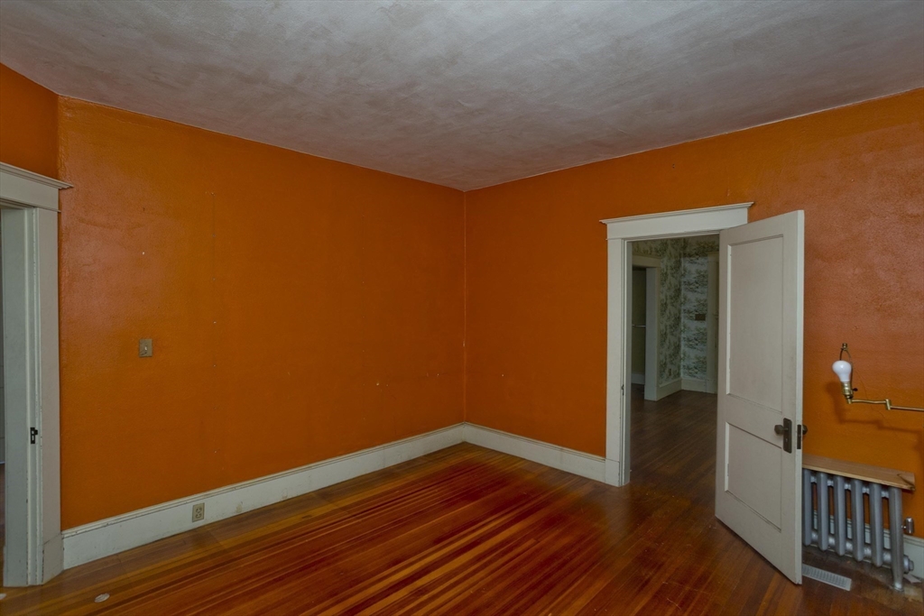 83 Mountain Road Wilbraham, MA 01095 - Photo 27 of 42 an empty room with wooden floor and closet