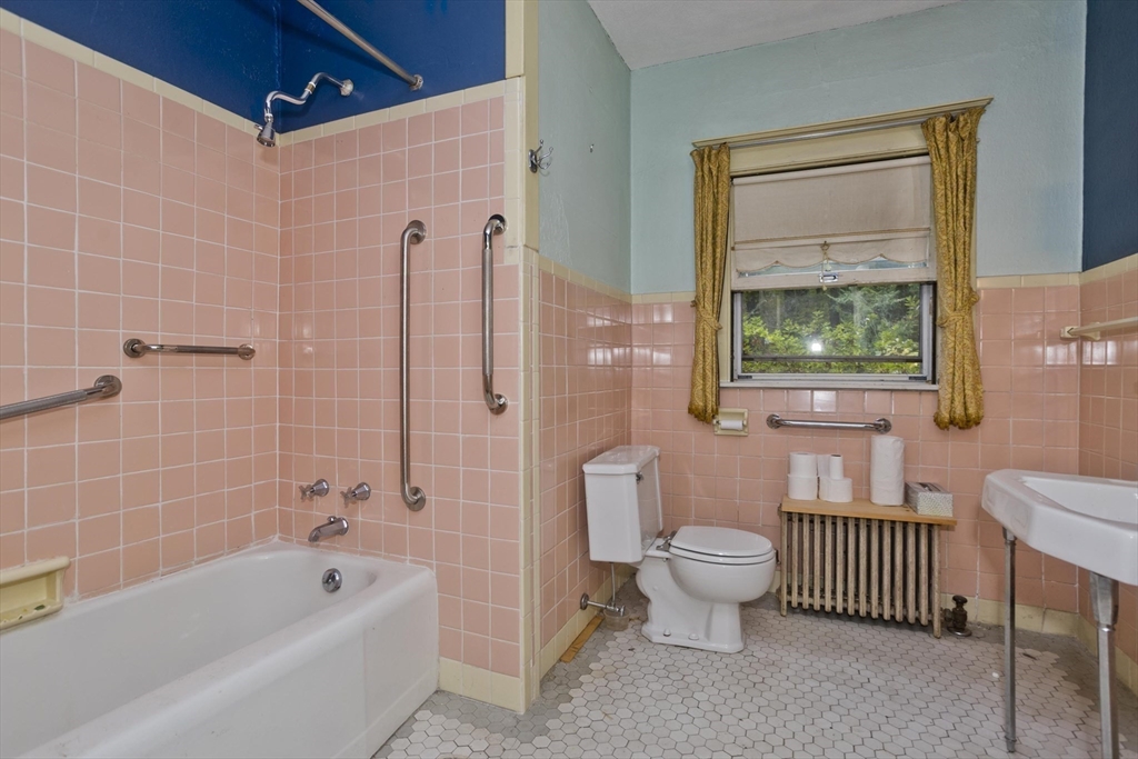 83 Mountain Road Wilbraham, MA 01095 - Photo 31 of 42 a bathroom with a bathtub toilet and sink