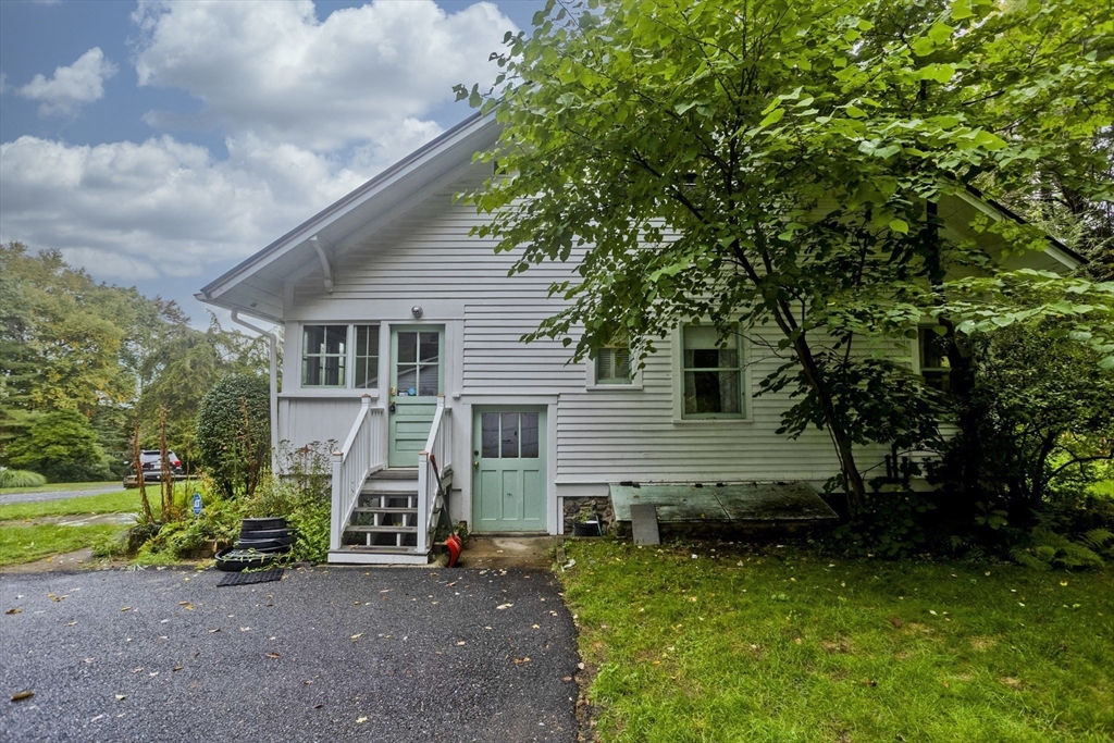 83 Mountain Road Wilbraham, MA 01095 - Photo 35 of 42 a view of backyard with a garden and entertaining space