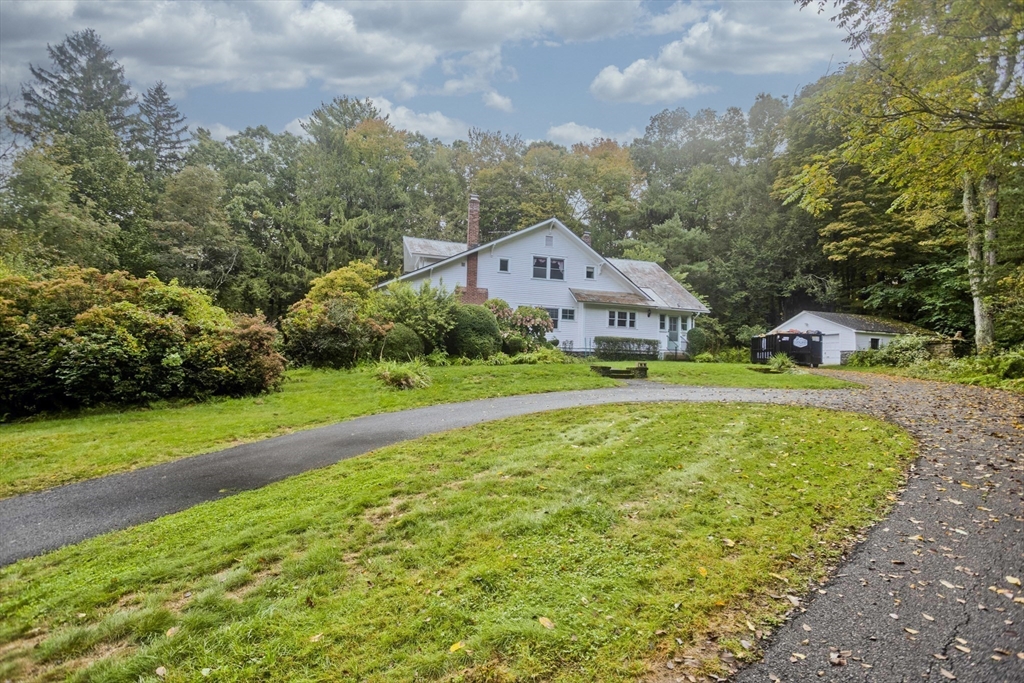 83 Mountain Road Wilbraham, MA 01095 - Photo 37 of 42 a view of house with garden space and trees