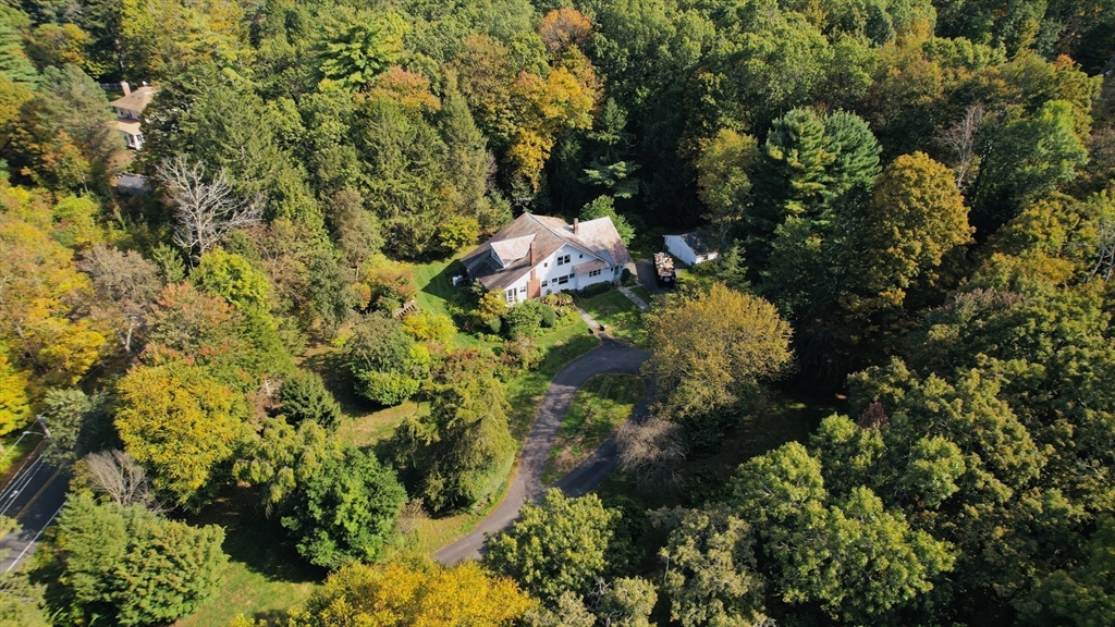 83 Mountain Road Wilbraham, MA 01095 - Photo 39 of 42 a backyard of a house with a yard and outdoor seating