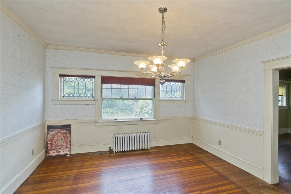 83 Mountain Road Wilbraham, MA 01095 - Photo 9 of 42 a view of an empty room with wooden floor and a window