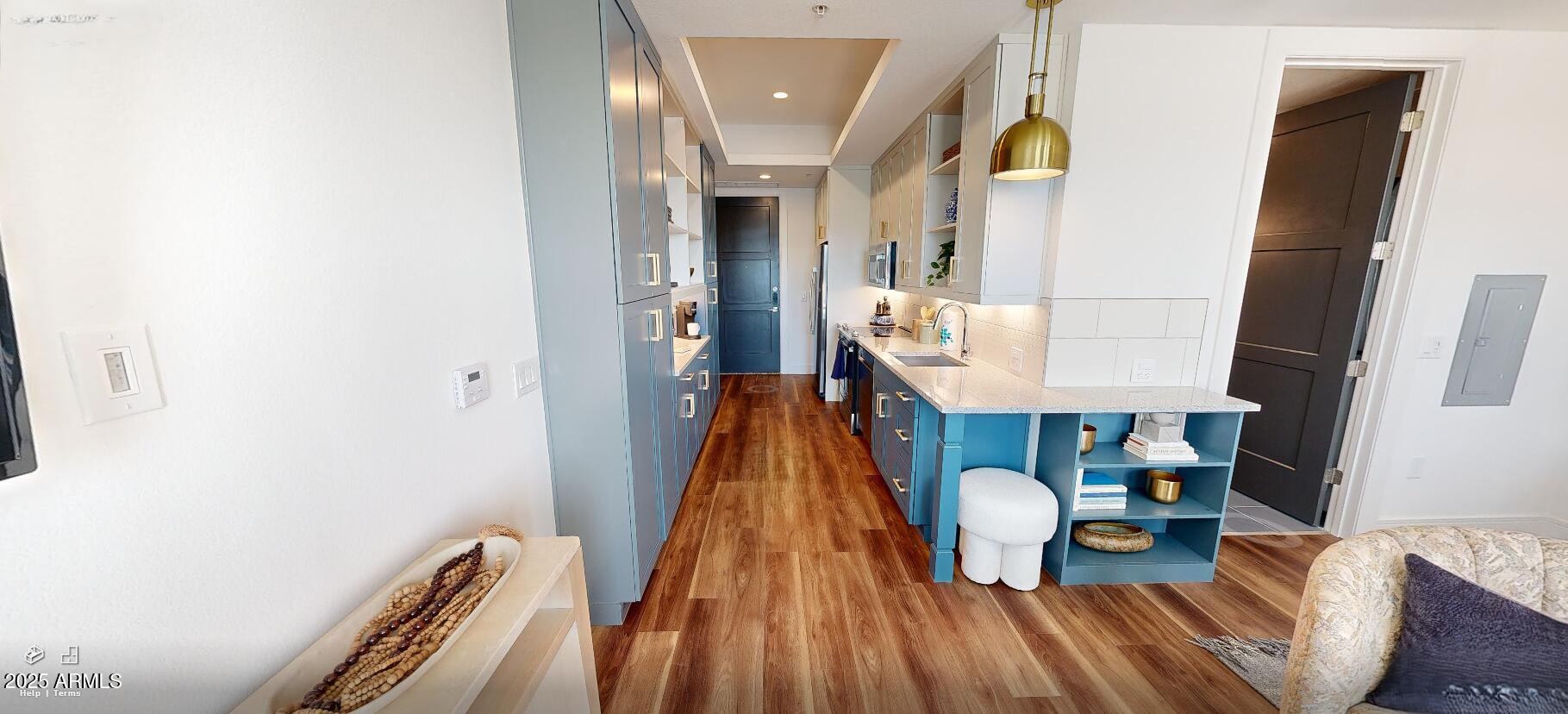 98 South River Drive, Unit S2 Tempe, AZ 85288 - Photo 4 of 14 a view of living room with furniture and wooden floor