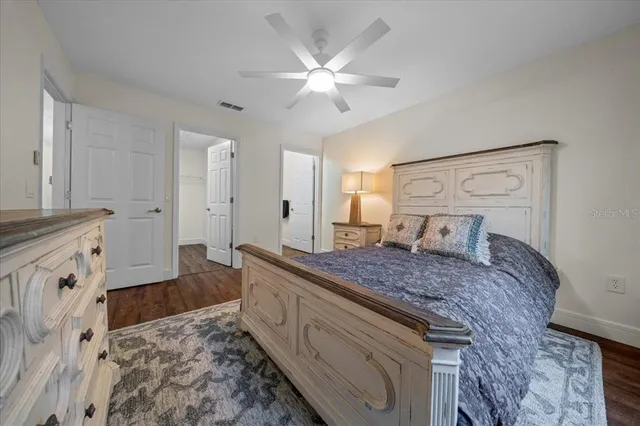 a bed room with a bed and a window