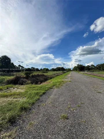 a view of lake with green space