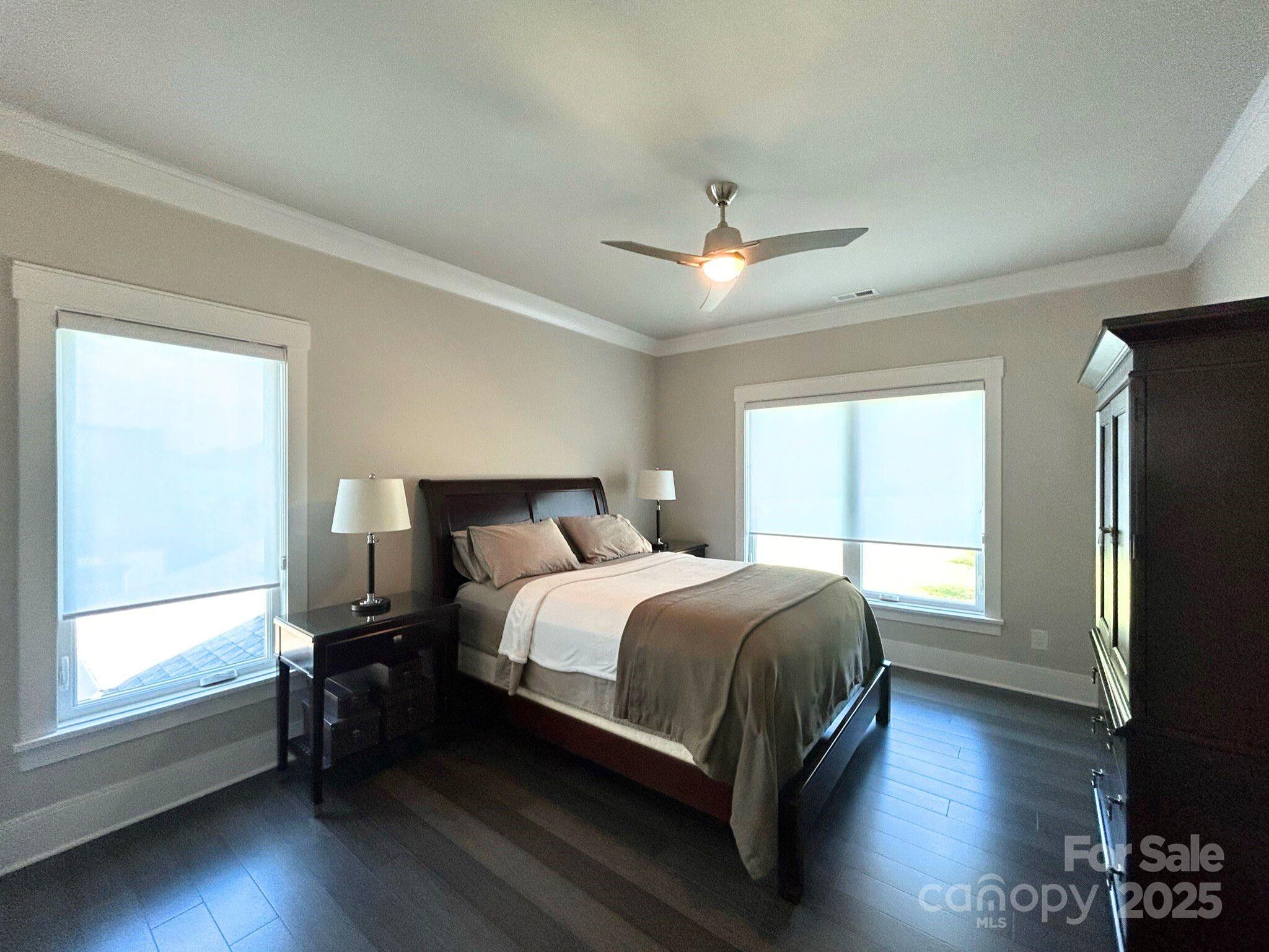 4067 Rivendell Road Denver, NC 28037 - Photo 20 of 37 a bedroom with a bed tv and window