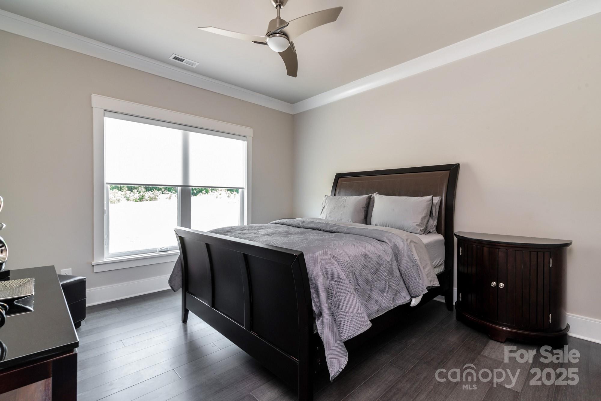 4067 Rivendell Road Denver, NC 28037 - Photo 21 of 37 a bedroom with a bed and a window