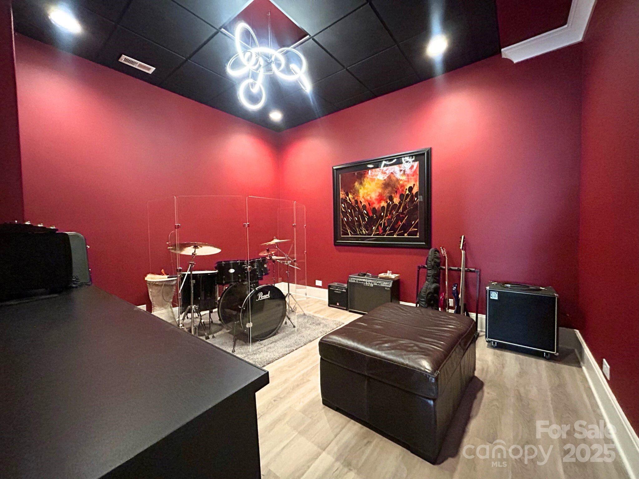 4067 Rivendell Road Denver, NC 28037 - Photo 29 of 37 a living room with furniture and a flat screen tv