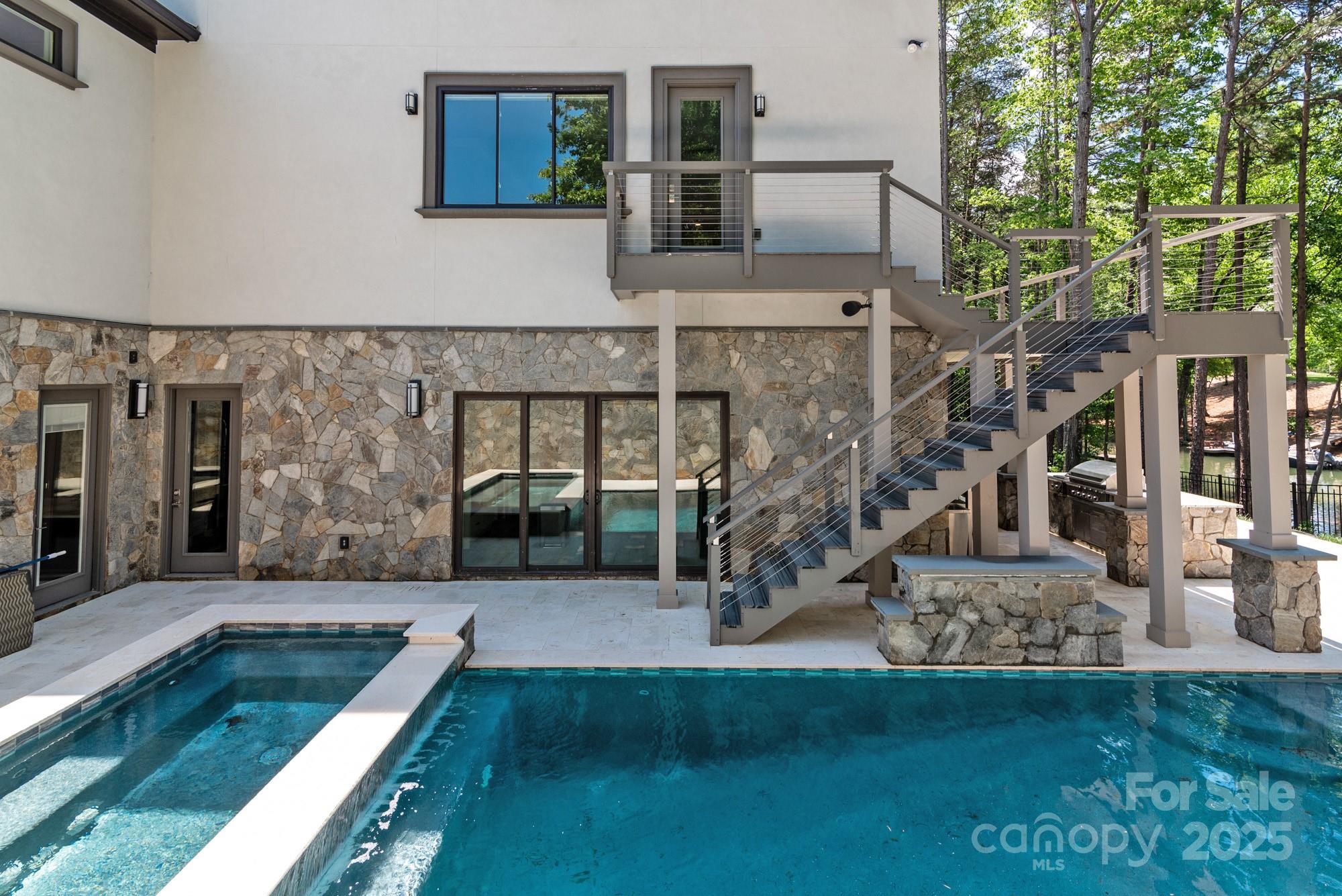 4067 Rivendell Road Denver, NC 28037 - Photo 31 of 37 a view of a house with a yard