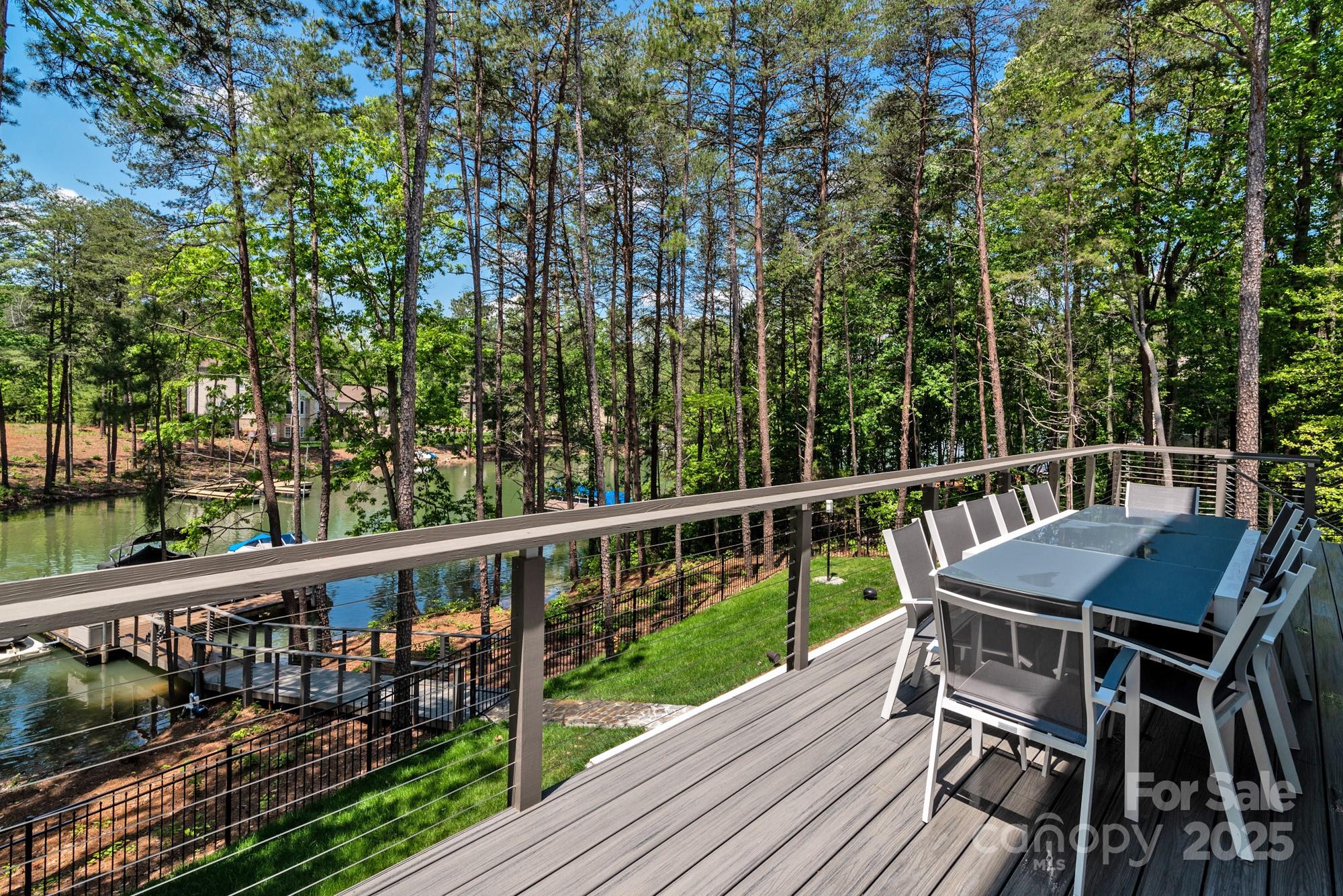 4067 Rivendell Road Denver, NC 28037 - Photo 34 of 37 a view of a balcony with wooden floor and outdoor seating