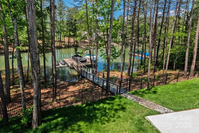 a outdoor space with patio the couches and chairs with the view of lake