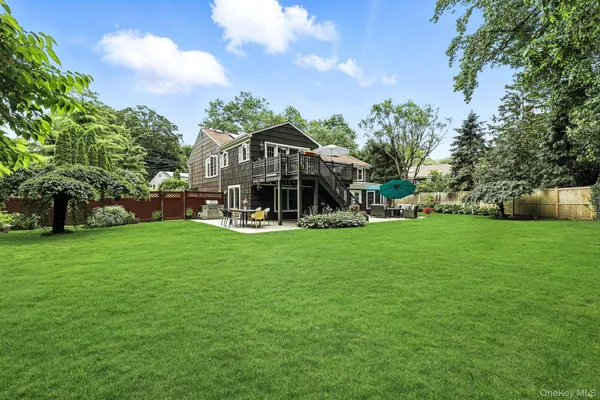 a view of a house with a big yard