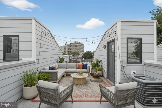 a building outdoor space with patio furniture