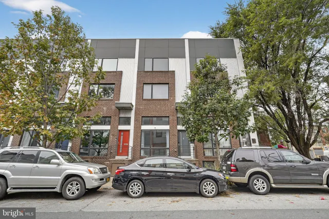 a car parked in front of a building