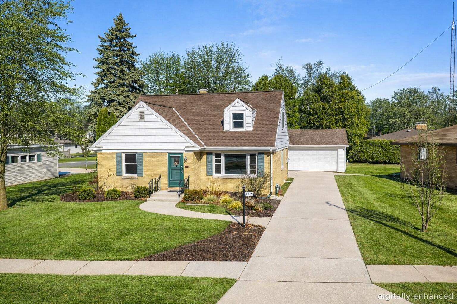 2014 Markham Street Manitowoc, WI 54220 - Photo 10 of 44 Certain images may contain digital enhancements, virtual staging, or altered elements for marketing purposes. Such images are illustrative only and do not represent exact current conditions of the property. Buyers should rely on their own inspections and due diligence