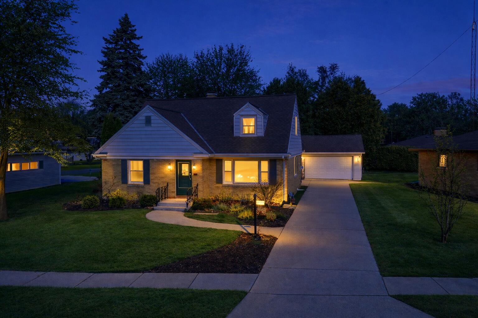 2014 Markham Street Manitowoc, WI 54220 - Photo 2 of 44 Certain images may contain digital enhancements, virtual staging, or altered elements for marketing purposes. Such images are illustrative only and do not represent exact current conditions of the property. Buyers should rely on their own inspections and due diligence