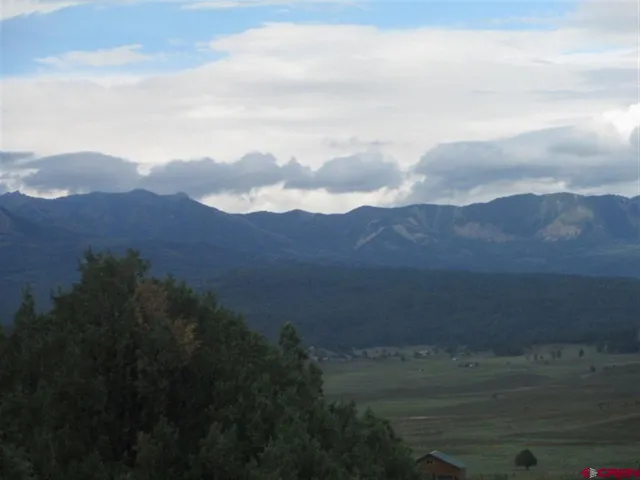a view of mountain with outside space