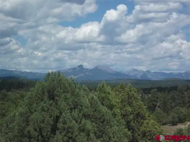 a view of lake with mountain