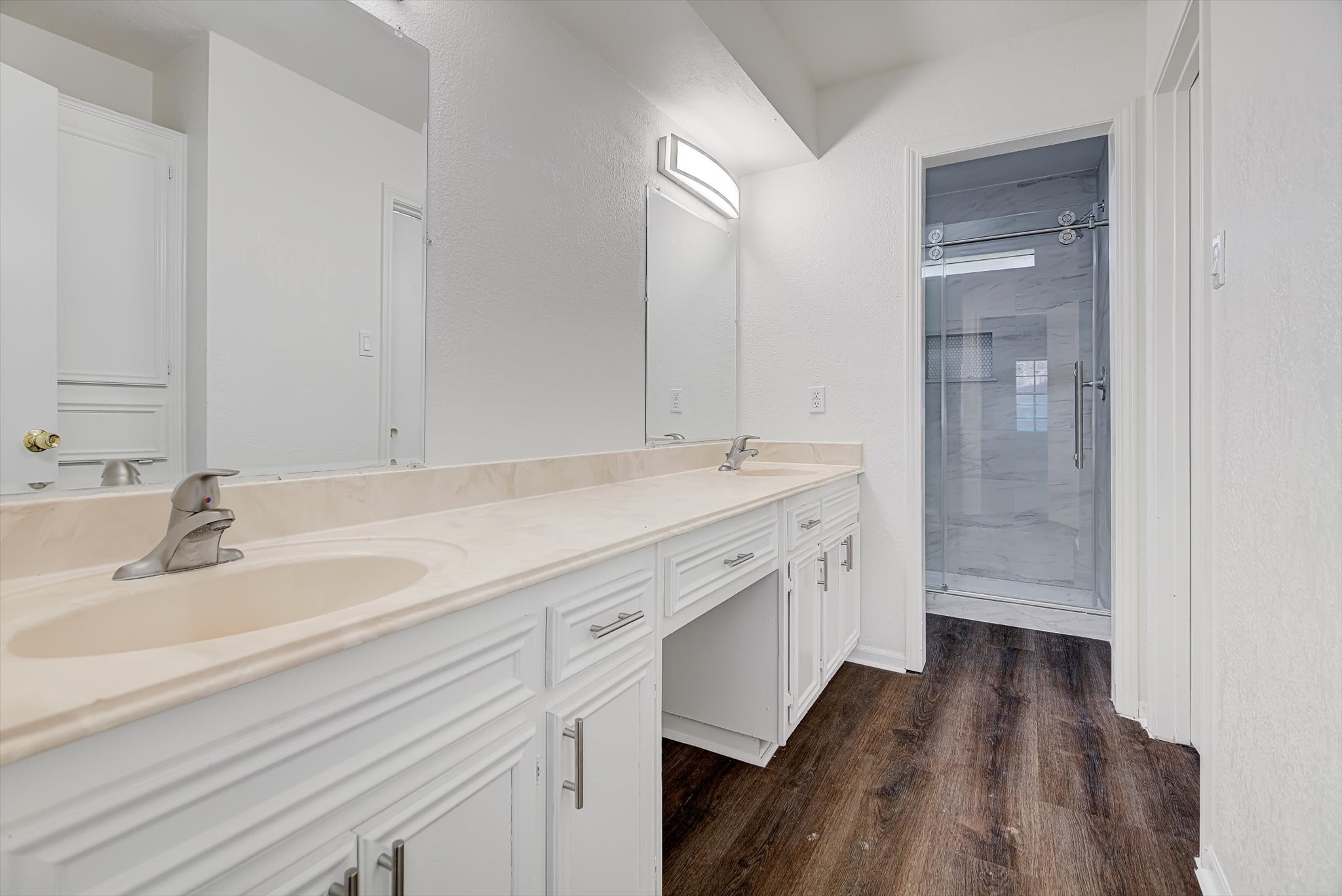 216 Any Way Street Lake Jackson, TX 77566 - Photo 23 of 49 a bathroom with a sink and a mirror