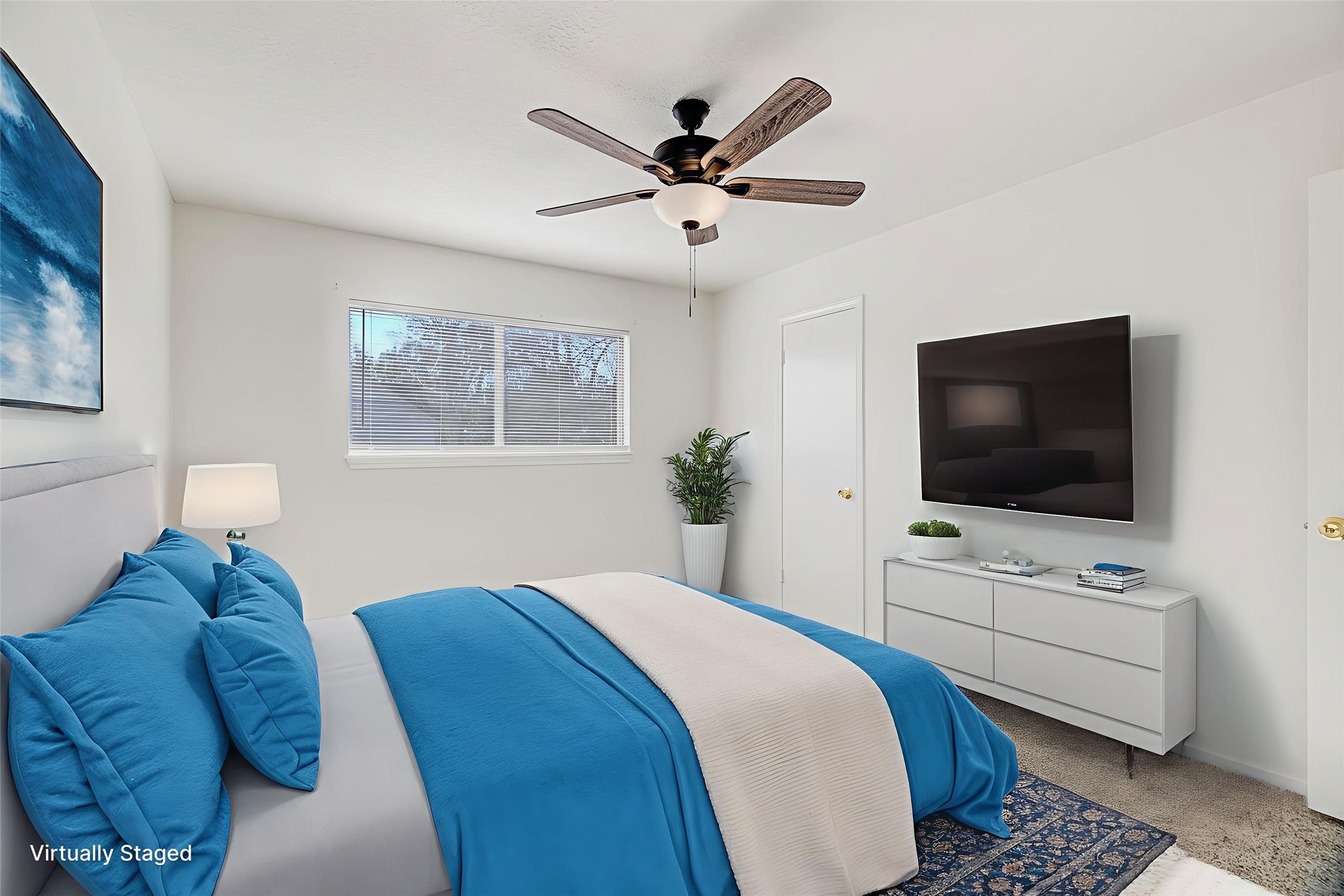 216 Any Way Street Lake Jackson, TX 77566 - Photo 35 of 49 a bedroom with a bed a window and a flat screen tv