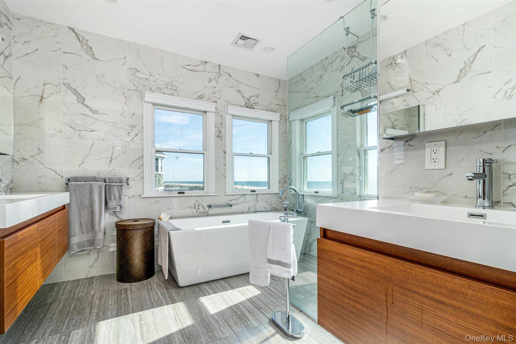 803 Dune Road West Hampton Dunes, NY 11978 - Photo 5 of 8 a large white kitchen with a sink and dish washer