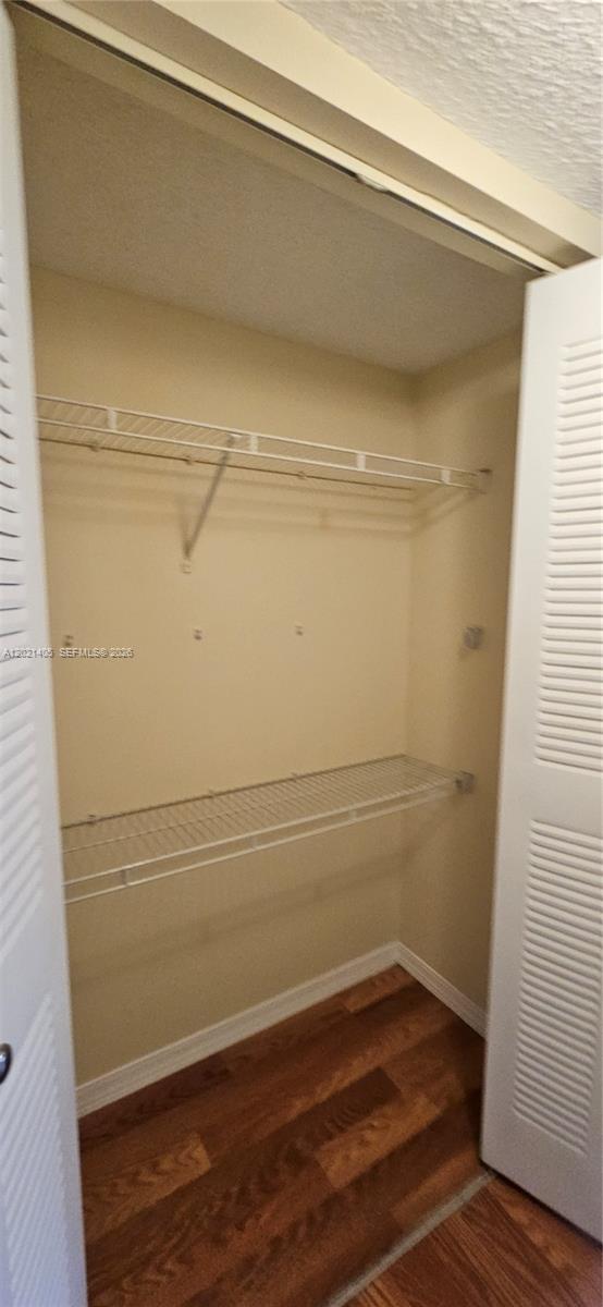 3870 Lyons Road, Unit 2098 Coconut Creek, FL 33073 - Photo 27 of 31 Primary 2nd Closet