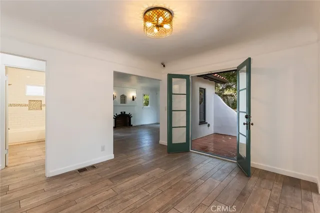 a view of livingroom with hardwood floor and a ceiling fan