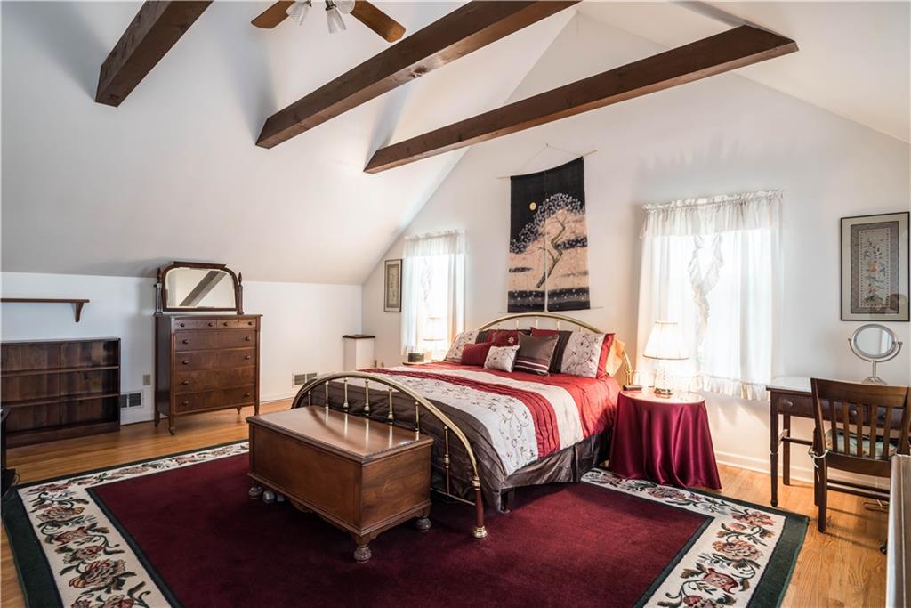 1964 Redcoach Road Allison Park, PA 15101 - Photo 13 of 25 Unbelievable master suite with cathedral ceilings and beams with two cedar window seats, two walk in closets and hardwood flooring.