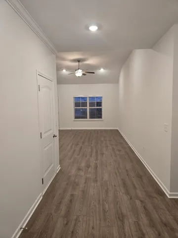 a view of kitchen with sink microwave and stove
